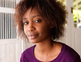 attractive-young-black-woman-with-afro-hair-PRZ8RVQ.jpg